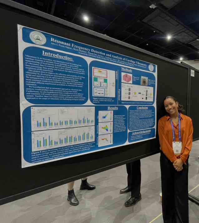 Julia Foote Najera presents her summer research at the 2025 Biomedical Engineering Society conference